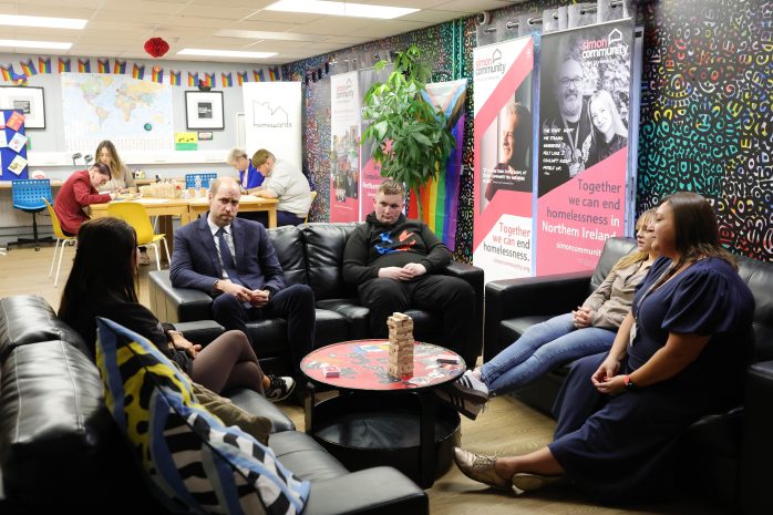 Prince William and group on sofas