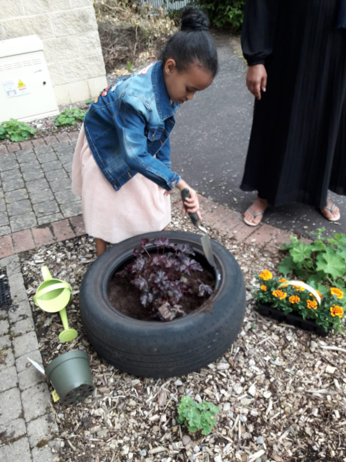 Simon Community Ensures No Child Left Behind Through New Play Learning Service Young Girl Gardening